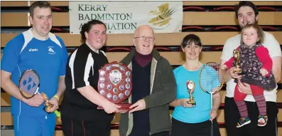  ??  ?? From left, Michael Reardon (Iveragh) and Paula O’Sullivan(Ballyheigu­e) accept the Division 4 Mixed Doubles Shield from Junior Griffin (County Chairman) along with runners-up Maria O’Connor (Killarney) and Seóda and Sean Bradley (Iveragh) at the...