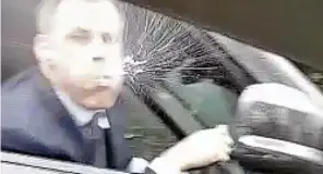  ??  ?? Shame: Jamie Carragher is caught on camera spitting at the car