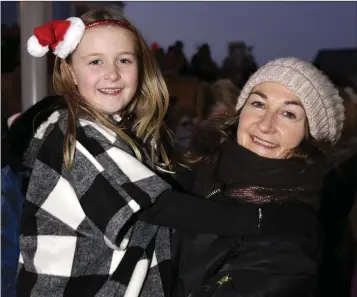  ??  ?? Niamh and Clodagh Davies at the switching on the Christmas lights at Bray Civic Plaza.