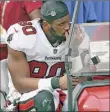  ?? Mark Lomoglio / Associated Press ?? Bucs tight end O.J. Howard is carted off the field after his Achilles injury Sunday.
