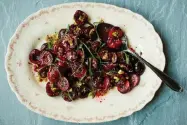  ?? Johnny Miller, © The New York Times Co. ?? Black Cherry-Pistachio Salad with Charred Scallion Vinaigrett­e.