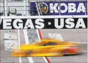  ?? JOSH HOLMBERG/ LAS VEGAS REVIEW-JOURNAL ?? NASCAR Monster Cup Series driver and Las Vegas native Kyle Busch crosses the start/finish line during practice for last year’s Kobalt 400 at Las Vegas Motor Speedway.