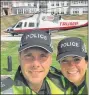  ??  ?? Two officers find time for a selfie while part of the security at the resort