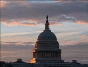  ?? THE ASSOCIATED PRESS ?? The U.S. Capitol in Washington at sunrise. Keep the government running and confirm Brett Kavanaugh as the next Supreme Court justice. Those are the big-ticket items that Republican leaders in Congress hope to accomplish as lawmakers look to wrap up their work in 2018 and head home to campaign for the November elections.