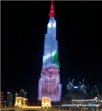  ?? Dubai Media Office ?? The Burj Khalifa on Saturday lights up with a photo of Sheikh Zayed bin Hamdan. —