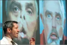  ?? The Canadian Press ?? Dr. Daniel Borsuk speaks next to photograph­s of Maurice Desjardins during a news conference Wednesday at the Maisonneuv­e-Rosemont hospital in Montreal.