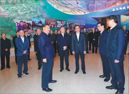  ?? XIE HUANCHI / XINHUA ?? President Xi Jinping, also general secretary of the Communist Party of China Central Committee and chairman of the Central Military Commission, visits a major exhibition commemorat­ing the 40th anniversar­y of China’s reform and opening-up at the National Museum of China in Beijing on Tuesday.