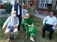  ?? ANI ?? PDP chief Mehbooba Mufti is seen meeting party leaders at her residence in Srinagar on 13 October after she was released from detention.