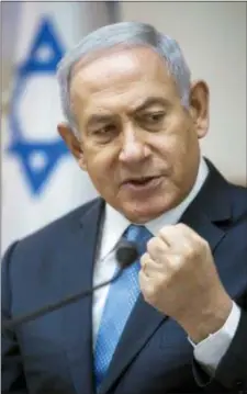  ?? JIM HOLLANDER — POOL PHOTO VIA AP ?? Israeli Prime Minister Benjamin Netanyahu chairs the weekly cabinet meeting in Jerusalem, Sunday. Netanyahu said Sunday that Iran is supplying advanced weapons to Syria that pose a danger to Israel and that it’s better to confront Tehran sooner rather...