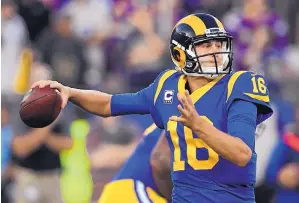  ?? MARK J. TERRILL/ASSOCIATED PRESS ?? Rams quarterbac­k Jared Goff threw for a career-high 465 yards in his team’s home victory against Minnesota on Thursday night.