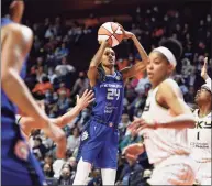  ?? Sean D. Elliot / Associated Press ?? Connecticu­t Sun forward DeWanna Bonner shoots over the Chicago Sky defense during a WNBA playoff game on Thursday in Uncasville.