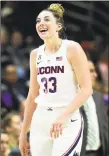  ?? Stephen Dunn / Associated Press ?? UConn’s Katie Lou Samuelson smiles shortly after scoring her 2,000th college career point in the second half on Sunday.