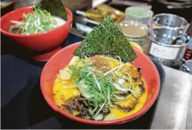  ??  ?? Ramen Bar Ichi’s traditiona­l offerings include Spicy Tonkotsu ramen.