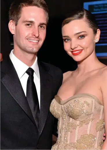  ??  ?? Power couple: Miranda Kerr and Snapchat co-founder Evan Spiegel at a party