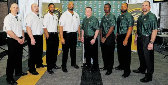  ?? LARRY WONG /EDMONTON
JOURNAL ?? The Edmonton Eskimos introduced most of their 2014 coaching staff on Tuesday. From left: Craig Dickenson (special teams co-ordinator), Craig Davoren (offensive assistant), Jason Shivers (defensive backs coach), Steve McAdoo (offensive co-ordinator),...