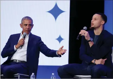  ?? PHOTOS BY RAY CHAVEZ — BAY AREA NEWS GROUP ?? Former President Barack Obama and Golden State Warriors star Stephen Curry speak during the fifth anniversar­y of My Brother’s Keeper Alliance Summit at the Scottish Rite Temple in Oakland on Tuesday.