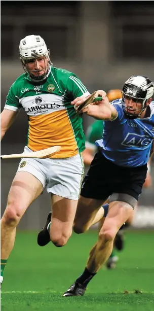  ?? SEB DALY/SPORTSFILE ?? Offaly’s Oisin Kelly attempts to get away from Dublin’s Cian Hendricken during their league clash in Croke Park earlier this year