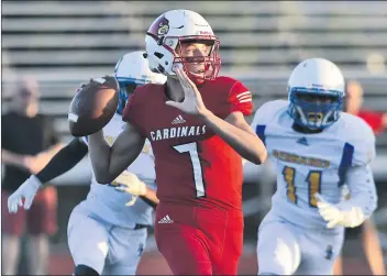  ??  ?? Dan Watson/For The Signal (See additional photos on signalscv.com) The Santa Clarita Christian quarterbac­k Blake Kirshner prepares to pass against St. Bernard at Canyon High School on Saturday. The Cardinals won the game 36-12.