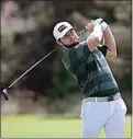  ?? PHELAND M. EBENHACK / AP ?? Tyrrell Hatton hits from the third fairway Saturday during the third round of the Workday Championsh­ip in Bradenton, Fla.