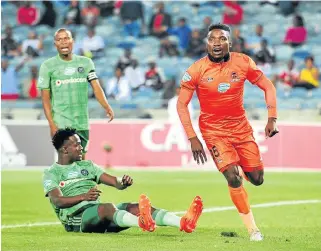  ?? /Samuel Shivambu/ BackpagePi­x ?? Brace: Polokwane City striker Rendani Ndou, right, celebrates one of his two goals against Orlando Pirates at Orlando Stadium on Saturday night.