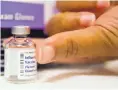  ?? DAVID GOLDMAN/ASSOCIATED PRESS ?? Preliminar­y figures released last week suggest this winter’s vaccine is 47 percent effective overall in preventing flu illness severe enough to send a patient to the doctor’s office.