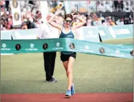  ??  ?? WAY TO GO!: South Africa’s Ann Ashworth won the women’s race with a time of 6:10.04.
