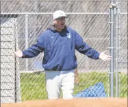  ?? Gregory Vasil / For Hearst Connecticu­t Media ?? Staples coach Jack McFarland appeals to the umpire during a game against Masuk on April 21, 2018.