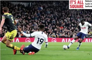  ??  ?? IT’S ALL
Ndombele, left, had some luck in putting Spurs ahead SQUARE
before Long equalised