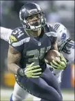 ??  ?? Seattle’s Thomas Rawls rushed for 161 yards Saturday night.