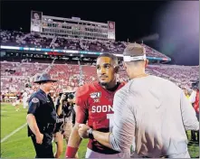  ?? [SARAH PHIPPS/ THE OKLAHOMAN] ?? Coach Lincoln Riley, right, and quarterbac­k Jalen Hurts want the Sooners to clean up some mistakes.