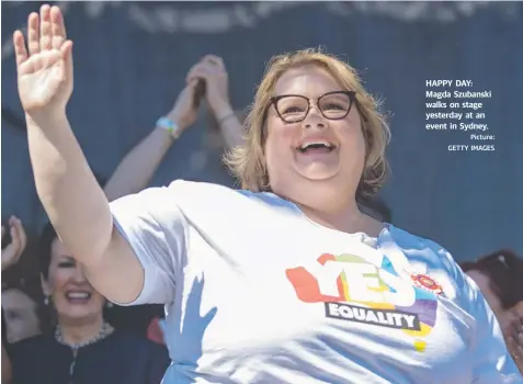  ?? Picture: GETTY IMAGES ?? HAPPY DAY: Magda Szubanski walks on stage yesterday at an event in Sydney.