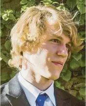  ?? MATTHEW WESTMORELA­ND ?? Riley Howell, right, a North Carolina college student who died while stopping a classroom shooting.