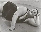  ?? PHOTO COURTESY OF NATIONAL GALLERY OF CANADA, OTTAWA, GIFT OF THE ESTATE OF LISETTE MODEL, 1990, BY DIRECTION OF JOSEPH G. BLUM, NEW YORK, THROUGH THE AMERICAN FRIENDS OF CANADA ?? “Coney Island Bather, New York,” by Lisette Model, circa 1939-July 1941 in a gelatin silver print.