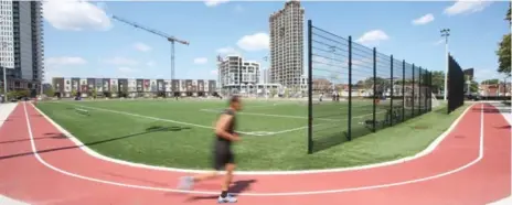  ?? VINCE TALOTTA/TORONTO STAR ?? The running track at the new Athletic Grounds, at Shuter and Sumach Sts., was built after Regent Park residents pushed for its constructi­on.