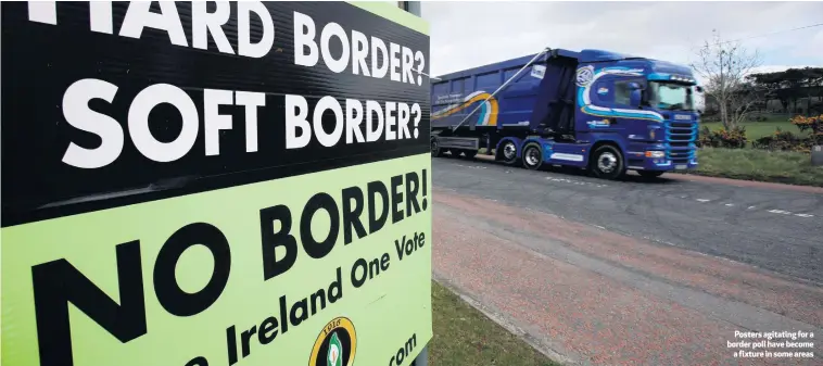  ??  ?? Posters agitating for a border poll have become
a fixture in some areas