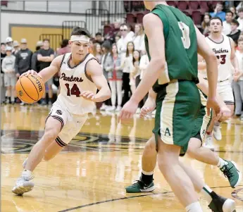  ?? Bud Sullins/Special to Siloam Sunday ?? Siloam Springs junior Landon Ward drives to the basket against Alma on Tuesday at Panther Activity Center.