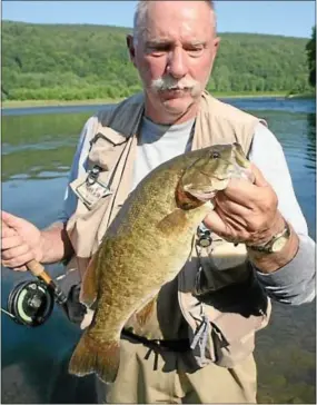  ?? Photo by Vic Attardo ?? The Delaware River should produce some beautiful smallmouth this summer, like                                                                                                                                           