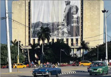  ?? Picture: EPA ?? FALLEN SOLDIER: An image of late Cuban leader Fidel Castro on a building in Havana.