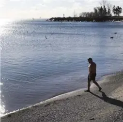  ?? RICHARD LAUTENS/TORONTO STAR FILE PHOTO ?? While some are turned off by cold water, others gladly swim in the GTA yearlong.