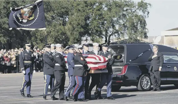  ?? PICTURE: GETTY IMAGES ?? 0 A military honour guard in Houston, Texas, carry the flag-draped casket of former president George HW Bush ahead of a flight to Washington, DC