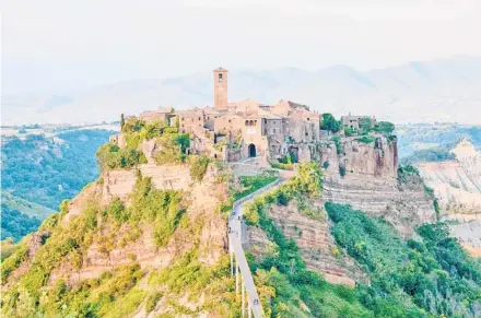  ?? DOMINIC ARIZONA BONUCCELLI/RICK STEVES’ EUROPE ?? Civita, perched on a pinnacle.