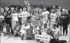  ?? Arkansas Democrat-Gazette/MITCHELL PE MASILUN ?? Members of Conway’s Project Unify team pose with their championsh­ip trophy after beating Forrest City in the Division A title game Friday at Bank of the Ozarks Arena in Hot Springs.