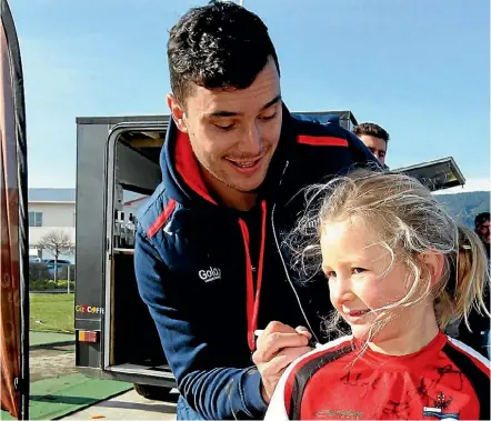  ?? PHOTO: PATRICK HAMILTON/FAIRFAX NZ ?? ‘‘Arthritis doesn't discrimina­te, it doesn't matter how old you are, you can get it at all stages of life.’’
James Lowe James Lowe signs a shirt for six-year-old Stella Blight of Richmond during the Tasman Makos Family Fun Day at Jubilee Park earlier...