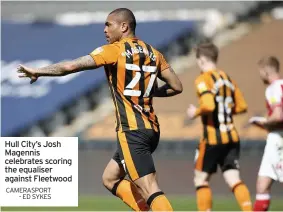  ?? CAMERASPOR­T - ED SYKES ?? Hull City’s Josh Magennis celebrates scoring the equaliser against Fleetwood