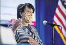  ?? ANDREW HARNIK — THE ASSOCIATED PRESS ?? District of Columbia Mayor Muriel Bowser wears a face mask to protect against the spread of the coronaviru­s outbreak, as she speaks at a news conference on the coronaviru­s and the District’s response, Monday, July 20, in Washington. In the face of newly rising infection numbers, Bowser says she’ll issue an executive order making face masks mandatory outside the home.
