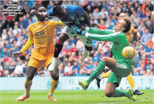  ??  ?? Head boy:
Alfredo Morelos opens the scoring at
Ibrox