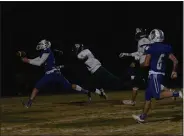  ?? CHIP THOMPSON — DAILY NEWS ?? Orland’s Luke Smith picks off Red Bluff’s Clyde Shaver in the first half Friday night in Orland.