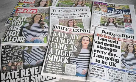  ?? | PHOTO : JUSTIN TALLIS, AFP ?? L’annonce du cancer de la princesse de Galles, Kate Middleton, faisait la une de tous les journaux britanniqu­es, hier. La population digère le choc.