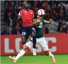  ??  ?? Lille’s Ivorian forward Nicolas Pepe vies with Nantes’ Argentinia­n forward Emiliano Sala. — AFP photo