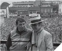  ??  ?? Graham Taylor with Watford Chairman, Elton John, after the 1984 FA Cup Final.